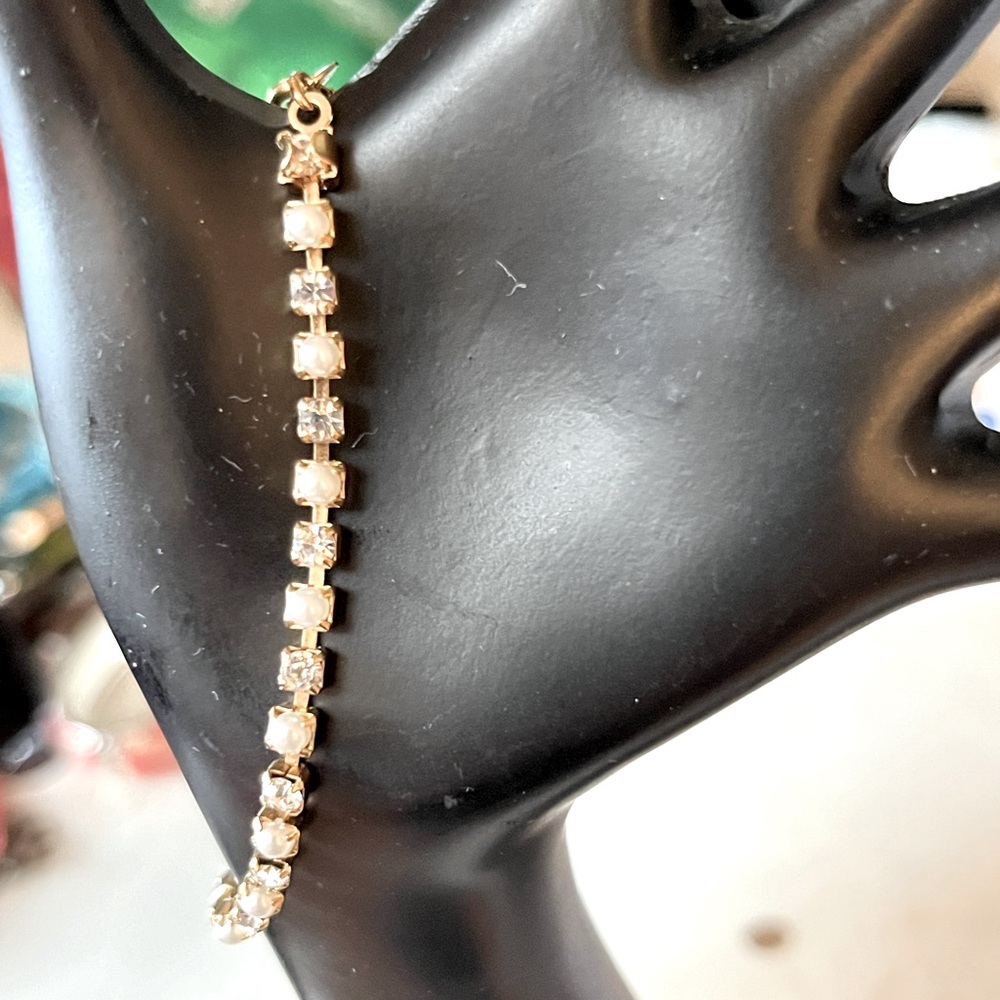 Pearl and white stone Avon bracelet.
